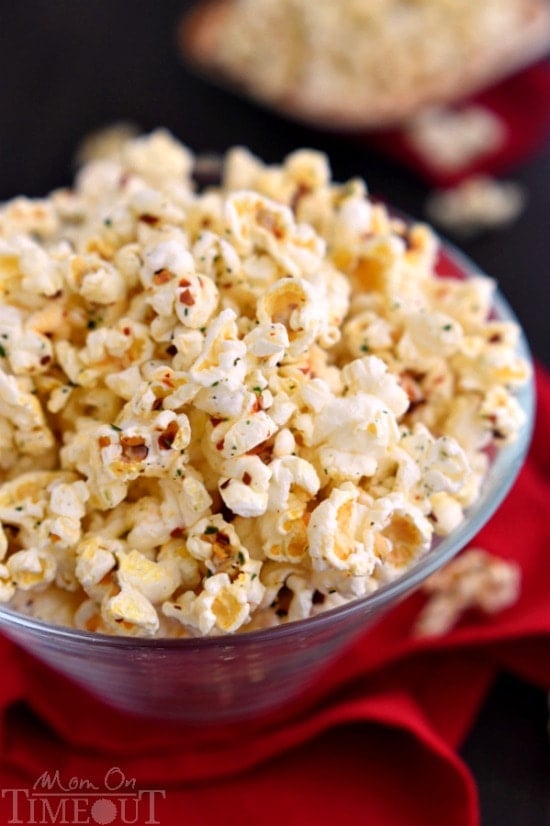 You're just 4 ingredients away from snacking paradise with this delicious Spicy Ranch Popcorn! So addicting, this delightfully easy recipe is sure to become a new family favorite! | MomOnTimeout.com | #appetizer #snack #recipe