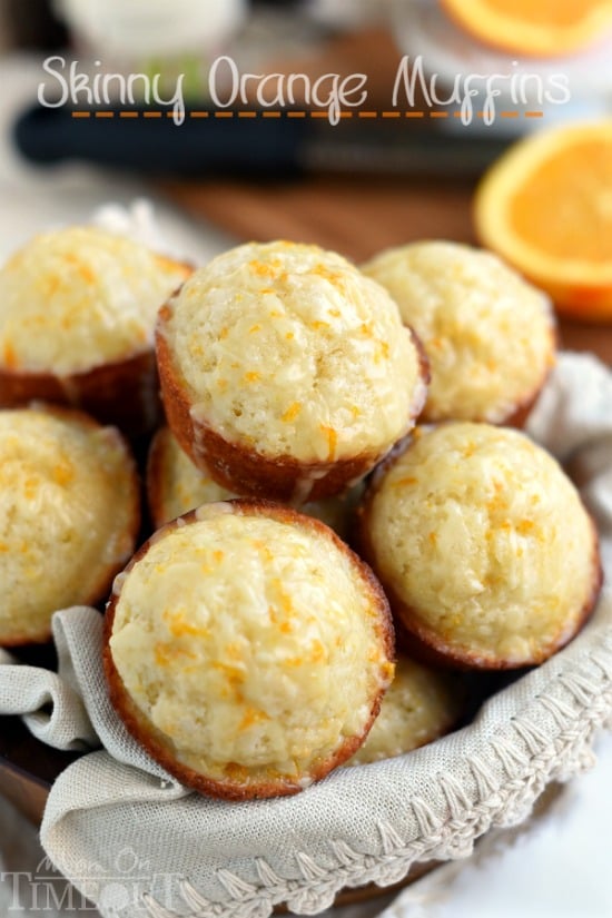 These Skinny Orange Muffins are made with Greek yogurt and plenty of orange zest for a terrific, bright orange flavor! So tender and moist, these muffins are a great way to start to your day! | MomOnTimeout.com | #breakfast #brunch #muffin #recipe #orange