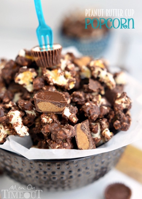 You're going to love this Peanut Butter Cup Popcorn with an explosion of peanut butter and chocolate flavors in every bite! | MomOnTimeout.com | #recipe #popcorn #chocolate #peanut #butter