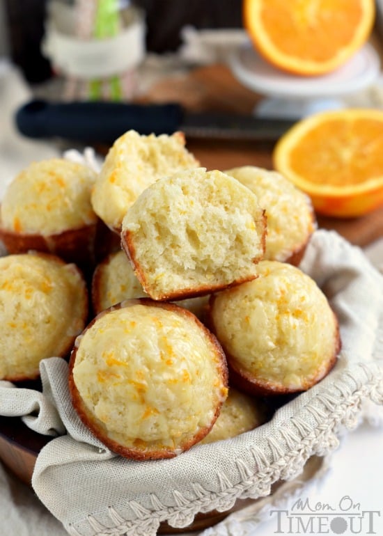 These Skinny Orange Muffins are made with Greek yogurt and plenty of orange zest for a terrific, bright orange flavor! So tender and moist, these muffins are a great way to start to your day! | MomOnTimeout.com | #breakfast #brunch #muffin #recipe #orange