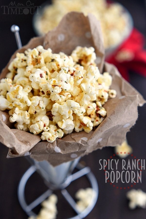 You're just 4 ingredients away from snacking paradise with this delicious Spicy Ranch Popcorn! So addicting, this delightfully easy recipe is sure to become a new family favorite! | MomOnTimeout.com | #appetizer #snack #recipe