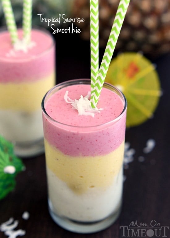 Make any morning better with this gorgeous, layered Tropical Sunrise Smoothie! | MomOnTimeout.com | #breakfast #smoothie #recipe