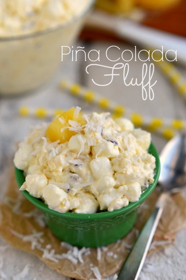 Bring that tropical feeling home with Pina Colada Fluff! An incredibly easy and delicious dessert salad! MomOnTimeout.com | #recipe #salad #dessert #pineapple #coconut