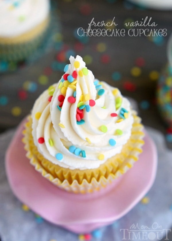 How about French Vanilla Cheesecake Cupcakes for the dessert win? It's like two desserts in one! Cheesecake filling is nestled inside a delicious vanilla cupcake and topped with the most amazing vanilla frosting ever - don't forget the sprinkles! | MomOnTimeout.com