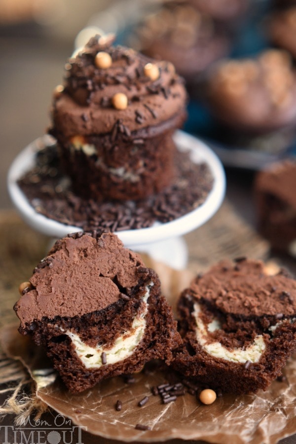 These Chocolate Cheesecake Cupcakes recipe with Whipped Ganache Frosting are sure to cure that chocolate craving! These cupcakes are the real deal - and that frosting - pure heaven! | MomOnTimeout.com | #PinThatTwist