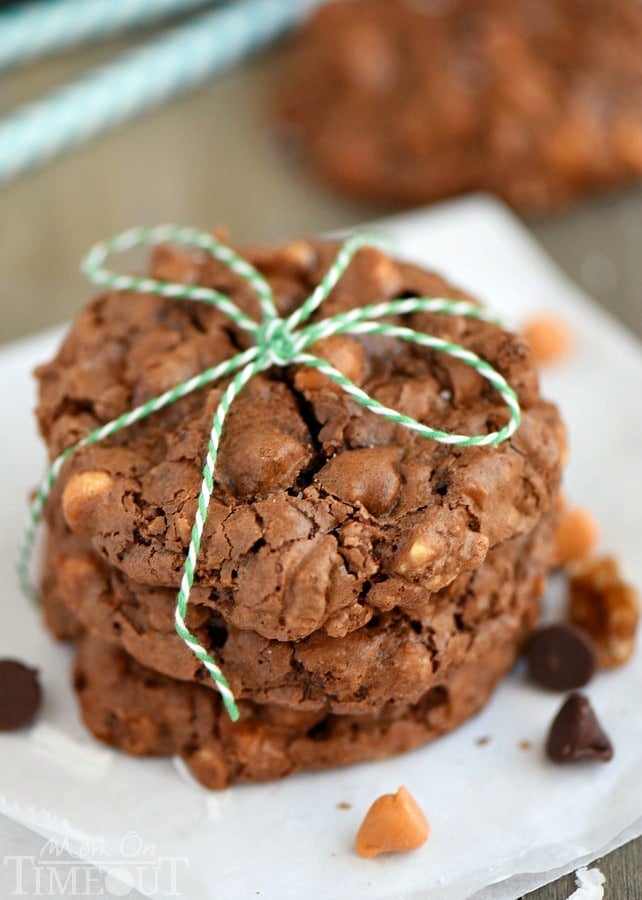 These Magic Brownie Cookies are packed full of flavor - coconut, butterscotch, walnuts, and of course, CHOCOLATE! This easy to make dessert will be a hit at your next party - no one can eat just one! | MomOnTimeout.com