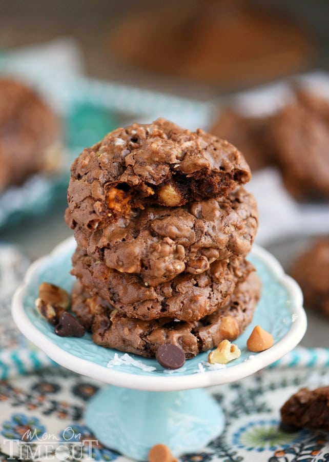 These Magic Brownie Cookies are packed full of flavor - coconut, butterscotch, walnuts, and of course, CHOCOLATE! This easy to make dessert will be a hit at your next party - no one can eat just one! | MomOnTimeout.com