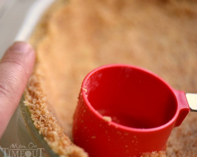 A step by step tutorial to your new favorite pie crust! This is the BEST Nilla Wafer Pie Crust ever and so easy too! | Mom OnTmeout.com