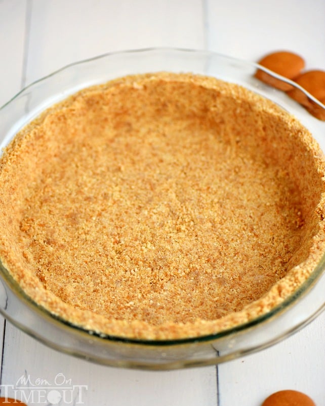 A step by step tutorial to your new favorite pie crust recipe! This is the BEST Nilla Wafer Pie Crust ever and so easy too! | MomOnTmeout.com