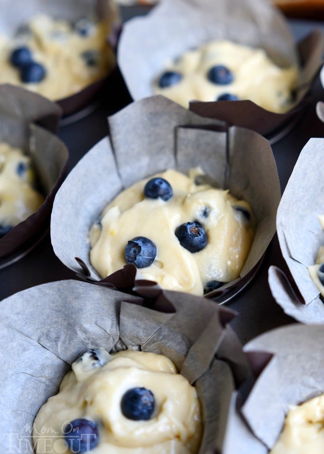 Blueberry Lemon Cream Cheese Muffins are the perfect way to start (or end) your day! An easy breakfast recipe that's sure to become a new favorite. Delicately moist and bursting with flavor, these muffins are topped with a refreshingly tart lemon glaze that's bound to make your mouth water. | MomOnTimeout.com | #IDelightIn10