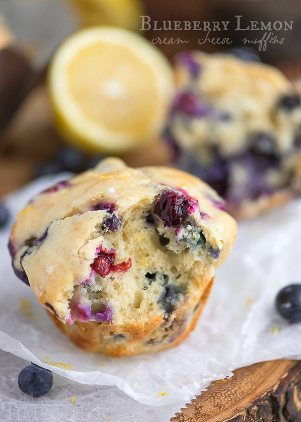 Blueberry Lemon Cream Cheese Muffins are the perfect way to start (or end) your day! An easy breakfast recipe that's sure to become a new favorite. Delicately moist and bursting with flavor, these muffins are topped with a refreshingly tart lemon glaze that's bound to make your mouth water. | MomOnTimeout.com | #IDelightIn10