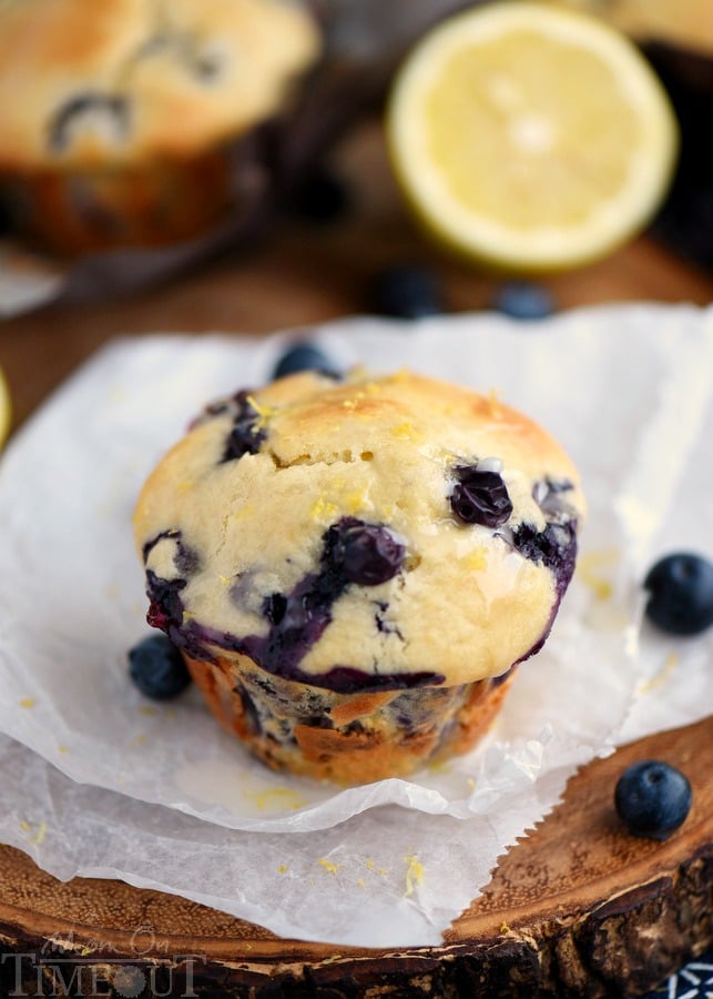 Blueberry Lemon Cream Cheese Muffins are the perfect way to start (or end) your day! An easy breakfast recipe that's sure to become a new favorite. Delicately moist and bursting with flavor, these muffins are topped with a refreshingly tart lemon glaze that's bound to make your mouth water. | MomOnTimeout.com | #IDelightIn10