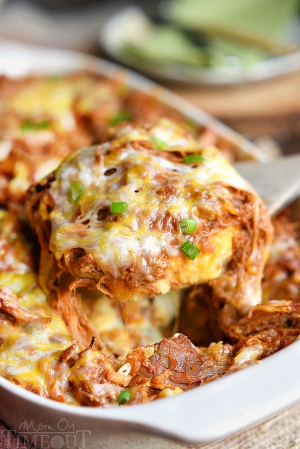 This crowd pleasing recipe is sure to be a hit at your next barbecue or picnic! This Loaded BBQ Pork Potato Casserole is so easy to make and crazy delicious. Comfort food at it's best! | MomOnTimeout.com