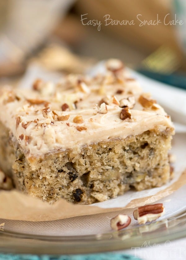 Easy Banana Cake with Brown Butter Maple Cream Cheese Frosting - just the recipe you were looking for to use up those ripe bananas! I hate throwing out extra ripe bananas and am always looking for ways to use them in baking. This cake is one of our favorites! // Mom On Timeout #bananacake #cake #recipe #desserts #baking #snackcake #maple #brownbutter #creamcheesefrosting banana cake recipe with brown butter maple cream cheese frosting and sprinkling of nuts