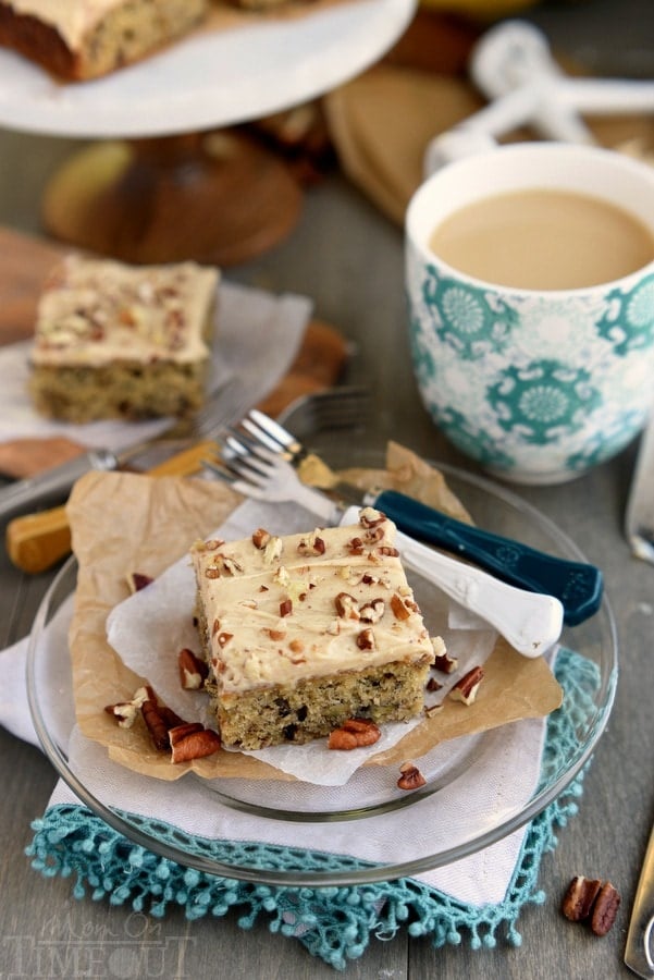 banana cake with coffee on plate and forks