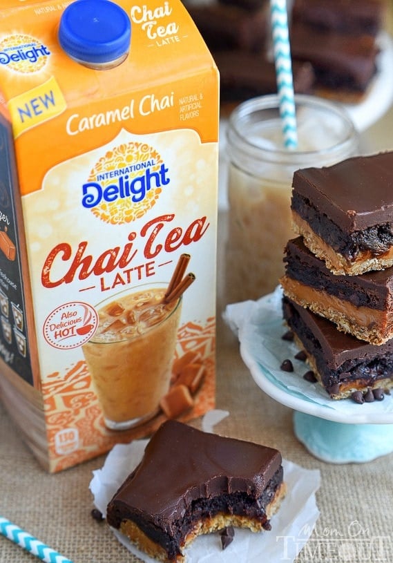 Four layers of intense flavor will have you craving these Oatmeal Caramel Truffle Brownies day and night! An oatmeal cookie crust topped with rich caramel, fudgy brownie and ganache frosting. Welcome to paradise. | MomOnTimeout.com | #IDelightIn10 #recipe 