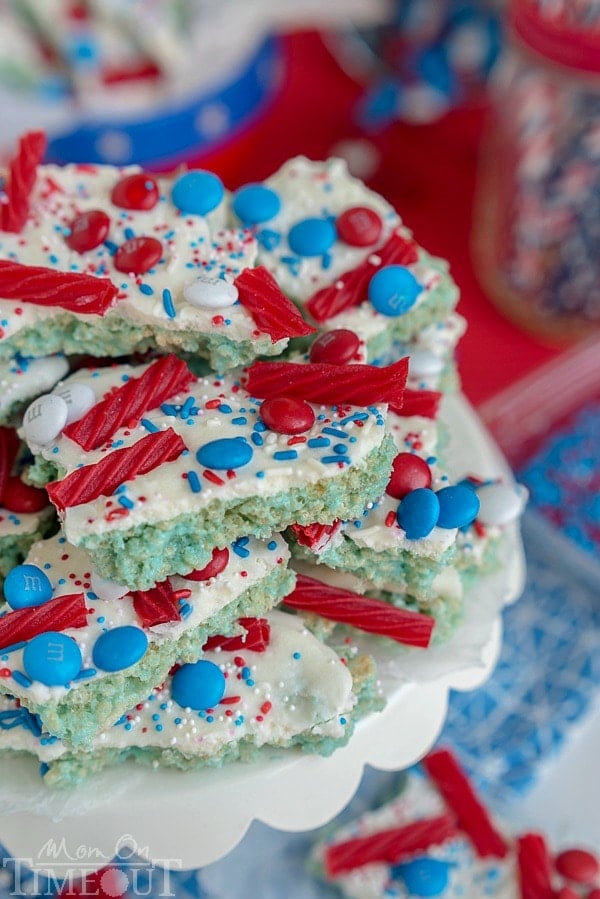 These sweet treats are sure to satisfy everyone! Colorful and festive, this Red White and Blue Rice Krispies Treats Bark is the perfect no-bake treat to celebrate with! | MomOnTimeout.com | #4thofjuly #laborday #memorialday