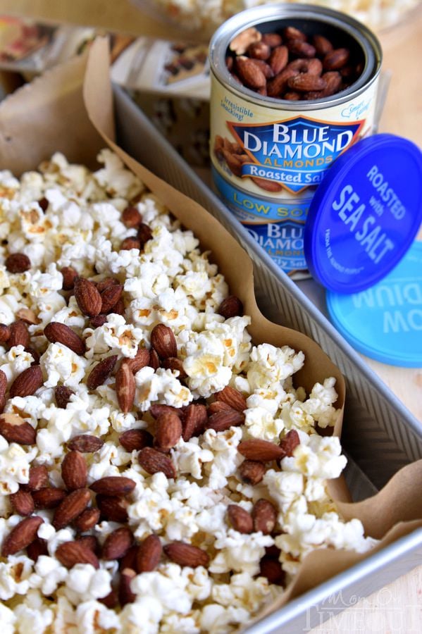 Welcome to your new favorite snack - Salted Caramel Popcorn with Almonds! Perfect for parties, road trips, family movie night and more! | MomOnTimeout.com