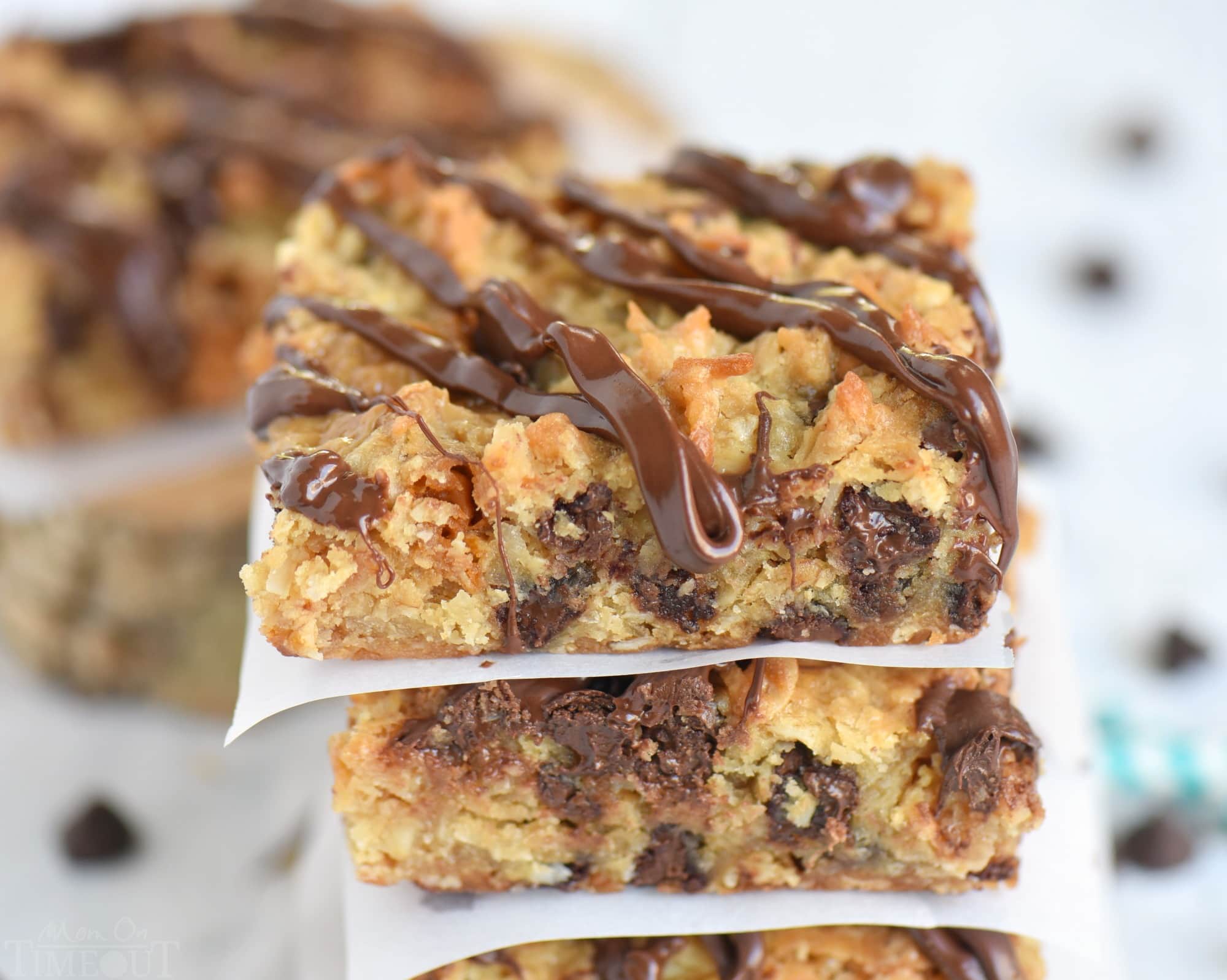 These Coconut Butterscotch Chocolate Chip Gooey Bars are sure to be a hit! So much flavor in one bite! Perfect for potlucks, picnics, road trips and more! // Mom On Timeout