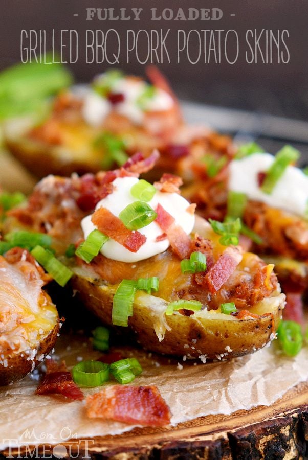 Too hot to cook indoors? Make these Fully Loaded Grilled BBQ Pork Potato Skins tonight! Fun enough for an appetizer yet hearty enough for a main dish, this delicious recipe is cooked straight on the grill and is perfect for all of your summer time entertaining! | MomOnTimeout.com | #recipe #appetizer #game #ad