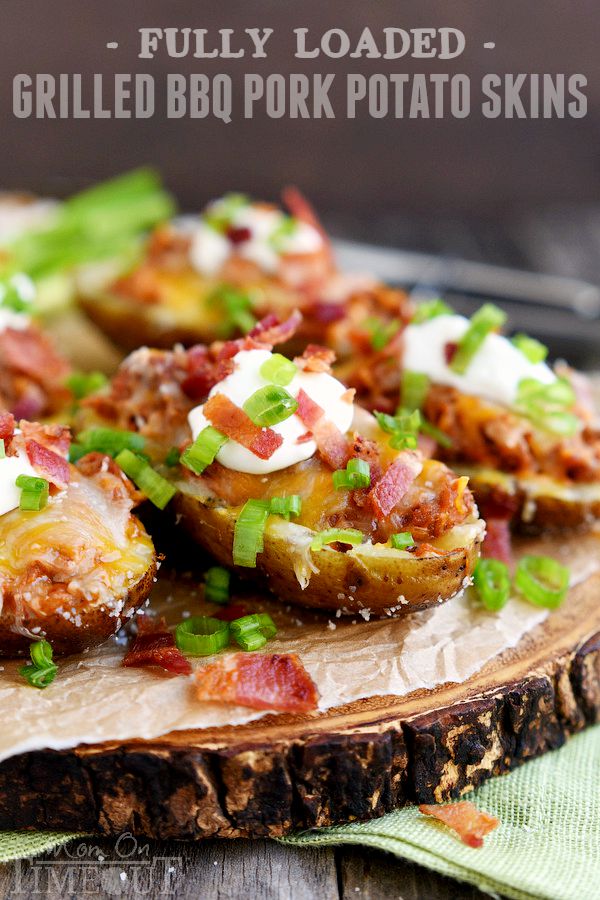 Too hot to cook indoors? Make these Fully Loaded Grilled BBQ Pork Potato Skins tonight! Fun enough for an appetizer yet hearty enough for a main dish, this delicious recipe is cooked straight on the grill and is perfect for all of your summer time entertaining! | MomOnTimeout.com | #recipe #appetizer #game #ad