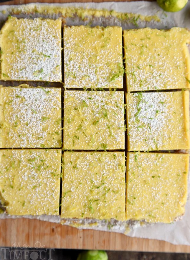 key lime bars on cutting board cut into squares