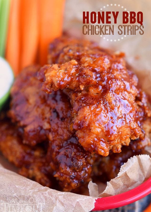  Sticky sweet Honey BBQ Chicken Strips are perfect for dinner or game day! Marinated in buttermilk and perfectly seasoned, these strips are hard to resist! | MomOnTimeout.com