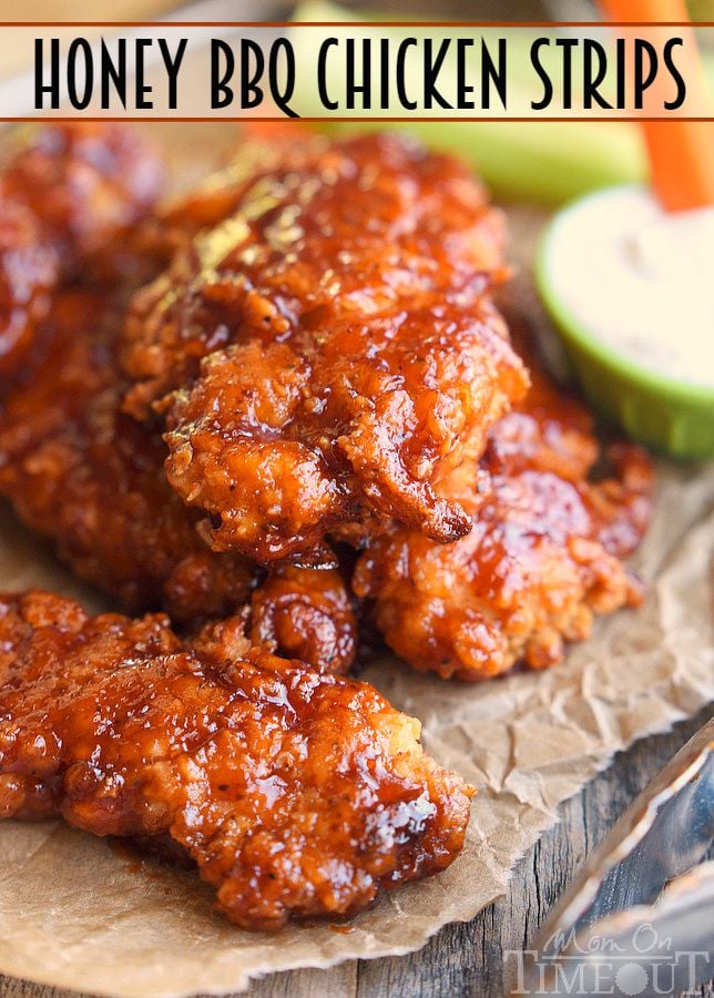  Sticky sweet Honey BBQ Chicken Strips are perfect for dinner or game day! Marinated in buttermilk and perfectly seasoned, these strips are hard to resist! | MomOnTimeout.com