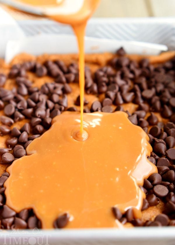 caramel being poured over chocolate chips 