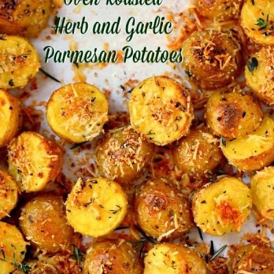 roasted potatoes with parmesan and garlic on sheet pan
