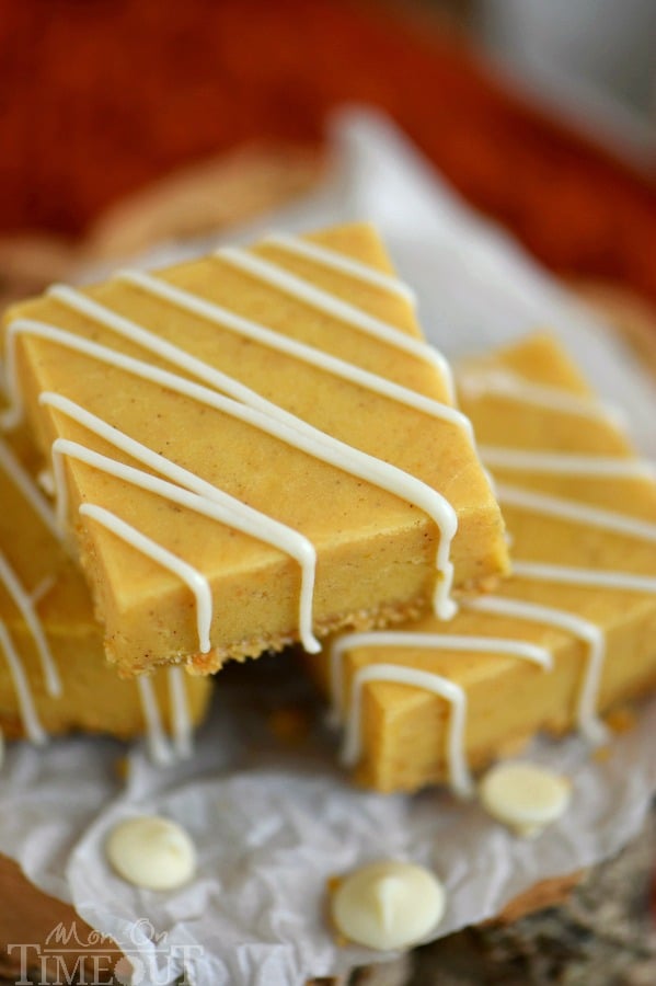 This delightful White Chocolate Pumpkin Pie Spice Fudge is made with real pumpkin, is sitting on a graham cracker crust and is topped with a white chocolate drizzle - perfection! Be sure to make a batch for friends and family this year!
