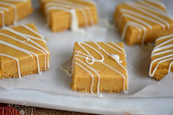 This delightful White Chocolate Pumpkin Pie Spice Fudge is made with real pumpkin, is sitting on a graham cracker crust and is topped with a white chocolate drizzle - perfection! Be sure to make a batch for friends and family this year!