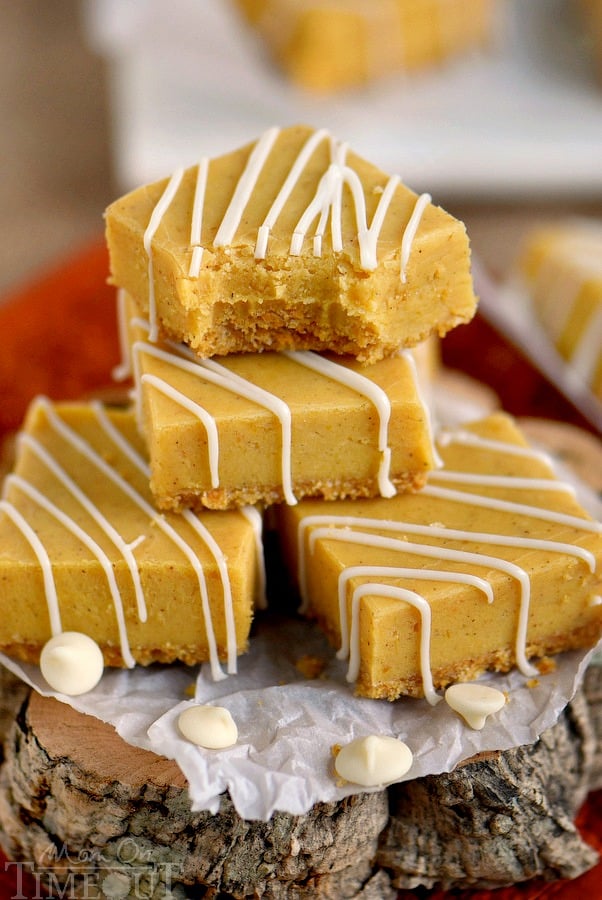 This delightful White Chocolate Pumpkin Pie Spice Fudge is made with real pumpkin, is sitting on a graham cracker crust and is topped with a white chocolate drizzle - perfection! Be sure to make a batch for friends and family this year!