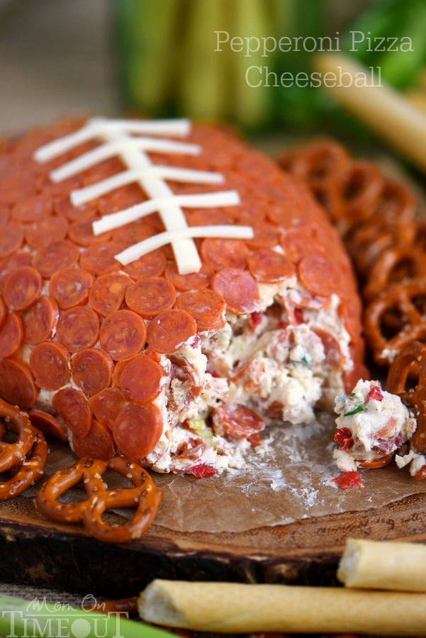 This Pepperoni Pizza Football Cheese Ball is my new favorite thing! Super easy to make and a total showstopper! Make this for your next game day celebration and watch the crowd go wild!