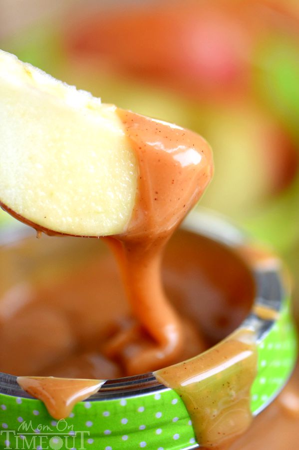 apple dipped into Pumpkin Spice Caramel Apple Dip