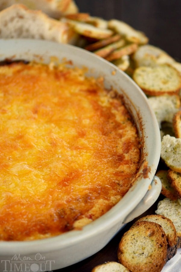 This Roasted Red Pepper Shrimp Scampi Dip is the perfect addition to your game day menu! Garlic, cheese, and roasted red peppers make for a creamy and rich appetizer nobody can resist!