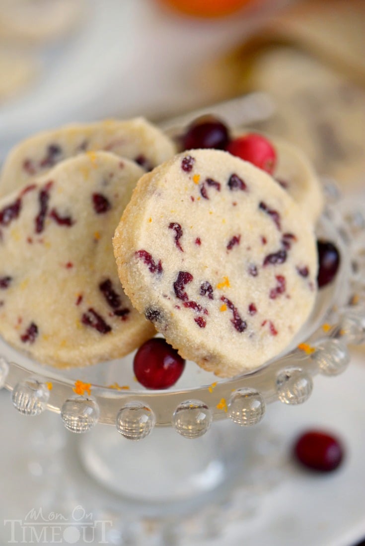 Cranberry Orange Shortbread Cookies combine two of my favorite holiday flavors in one easy to make cookie that will wow friends and family! A delightfully easy cookie recipe that yields sensational results! I'm sharing three secrets to the perfect shortbread cookies that no one can resist! Make sure to add these easy shortbread cookies to your holiday baking list this season! // Mom On Timeout #cookies #shortbread# cranberry #orange #Christmas #baking #holidays #Thanksgiving shortbread-cookies-cranberry-orange