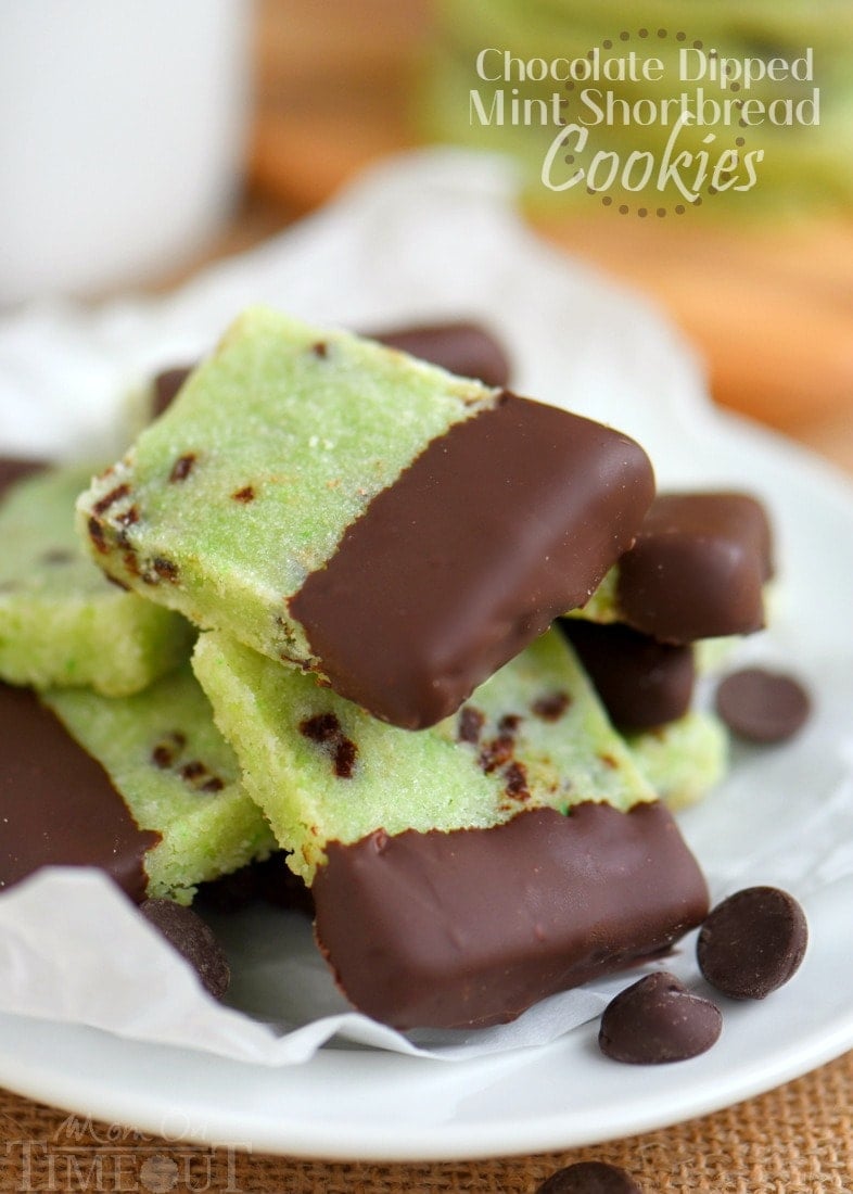 mint shortbread cookies dipped in chocolate and arranged on a white plate