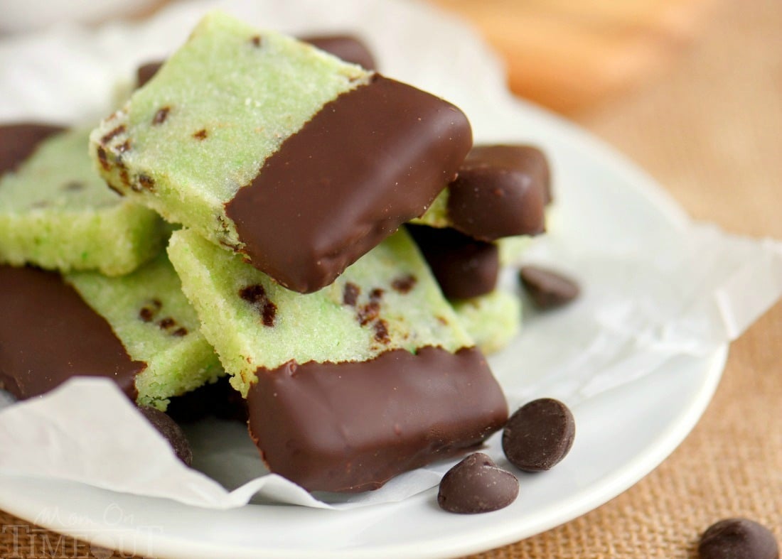 Delightfully easy Chocolate Dipped Mint Shortbread Cookies are perfect for the holidays! Mint and chocolate is the BEST combination and it really shines through in these buttery cookies!