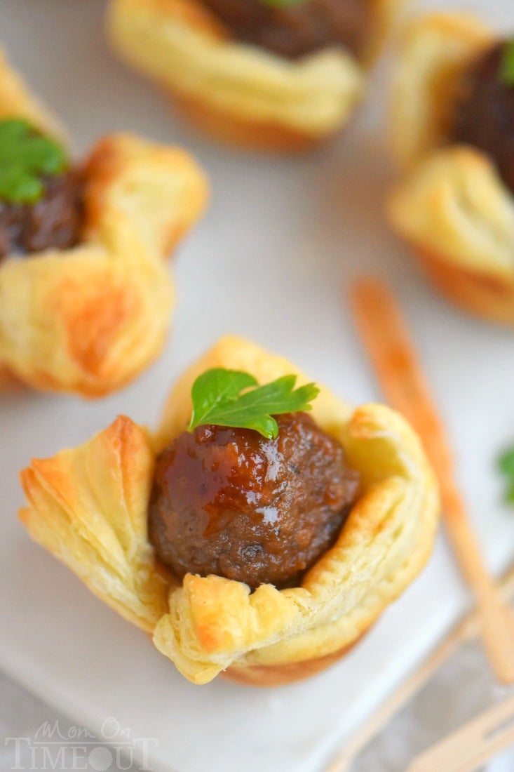 An impressive yet delightfully simple appetizer that is perfect for any celebration - Slow Cooker Cranberry Orange Meatballs! Just five ingredients and tons of delicious flavor!