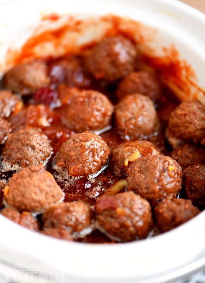 An impressive yet delightfully simple appetizer that is perfect for any celebration - Slow Cooker Cranberry Orange Meatballs! Just five ingredients and tons of delicious flavor!