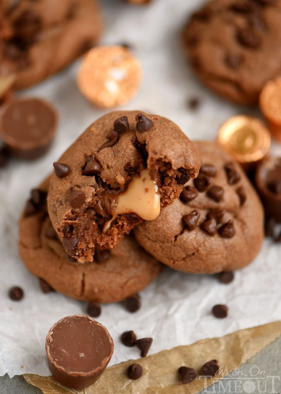 The ooey gooey centers of these Rolo Stuffed Chocolate Cake Mix Cookies will satisfy your deepest chocolate cravings! Hot from the oven, these easy cookies are impossible to resist!