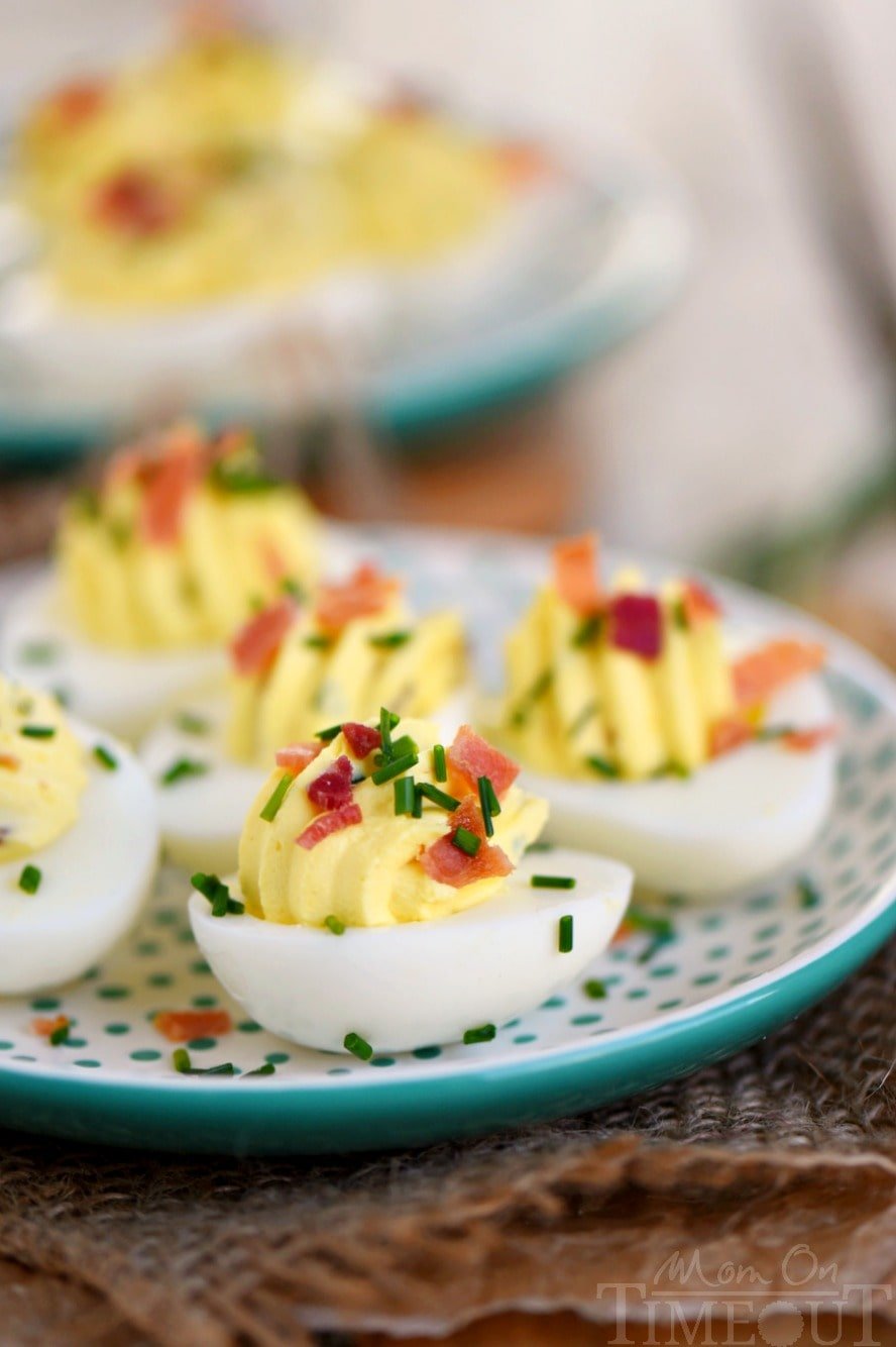 Bacon Cream Cheese Deviled Eggs are delightfully creamy and perfectly savory with the addition of bacon and chives! Double the batch because these won't last long! The perfect appetizer for picnics, BBQ's and parties!