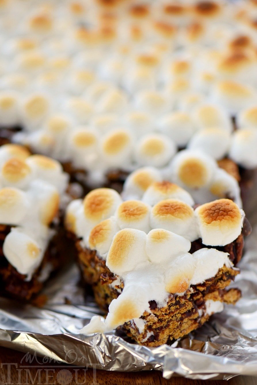 This delightfully easy recipe for 5 Minute S'mores Cereal Bars is going to become a new favorite for sure! Just 5 ingredients and loads of authentic s'mores flavor, these bars are adored by kids and adults alike!