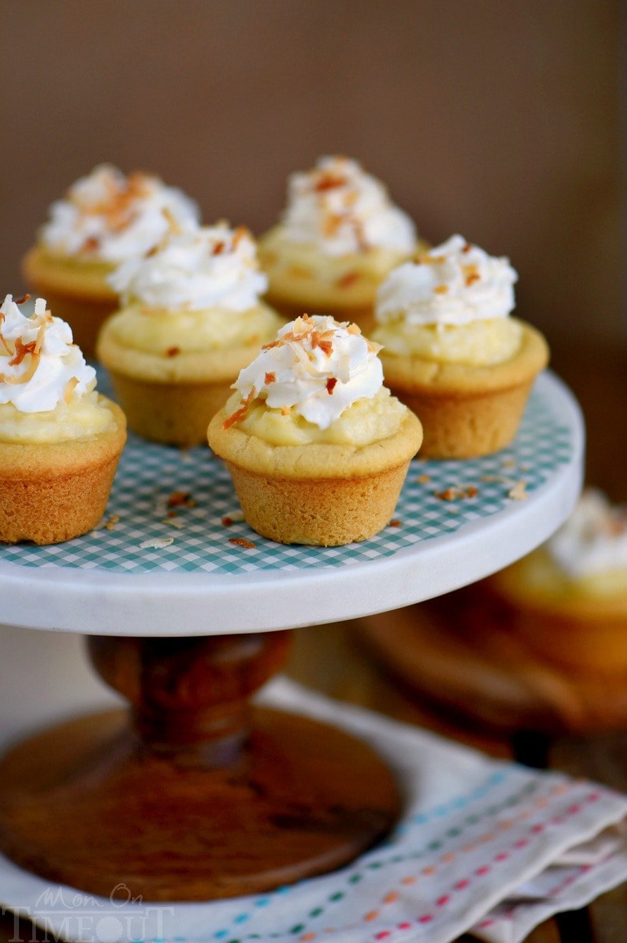 Coconut Cream Pie Cookie Cups! Two of my favorite desserts collide in this easy to make recipe that will have your guests oohing and aahing in no time!