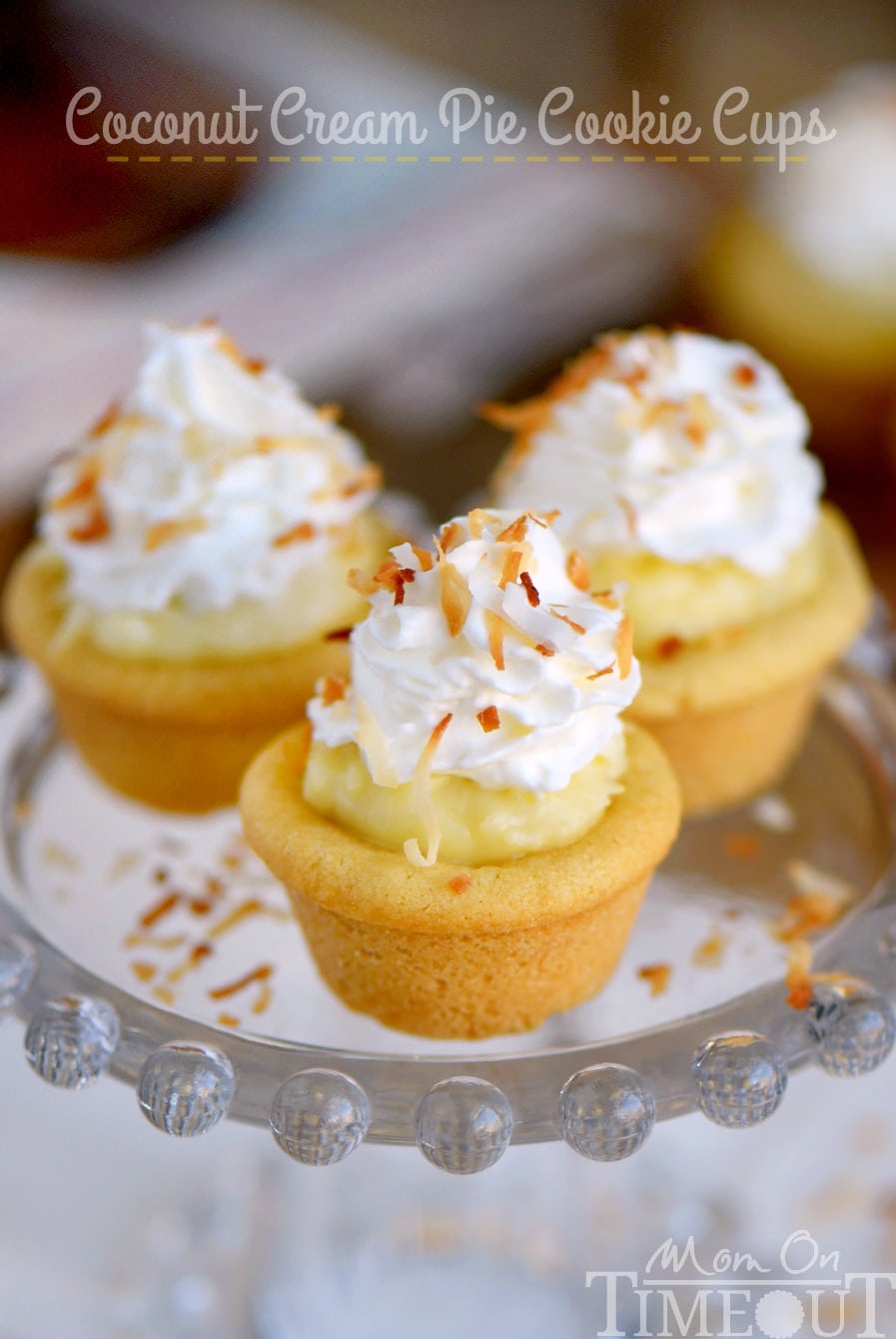 Coconut Cream Pie Cookie Cups! Two of my favorite desserts collide in this easy to make recipe that will have your guests oohing and aahing in no time!
