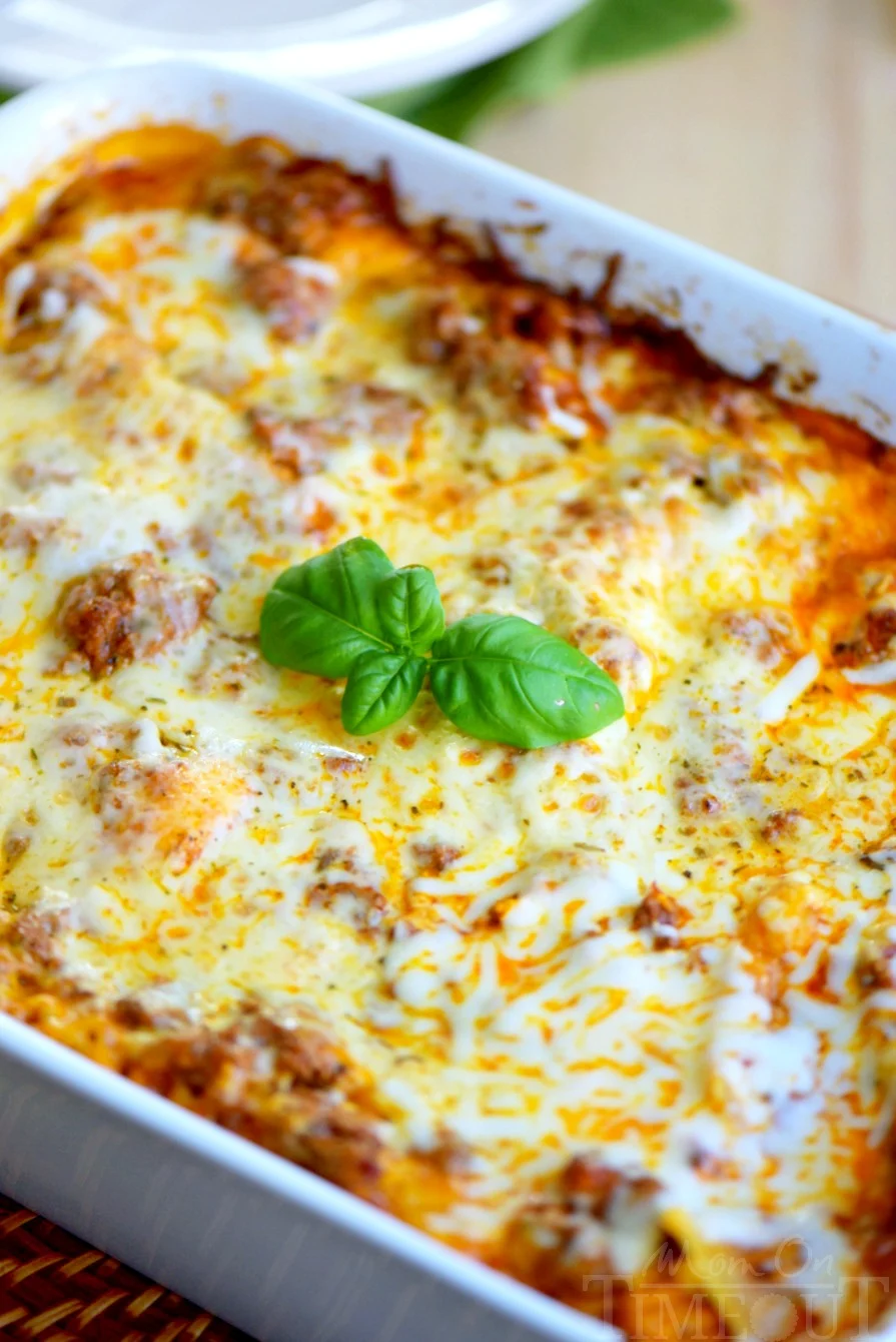This easy Lasagna recipe is perfect for busy weeknights! An amazing comfort dish that the whole family will love. I use a few tricks and a super simple recipe that yields sensational results. Lasagna doesn't have to be reserved for weekends any longer! // Mom On Timeout #lasagna #dinner #recipe #entree #cheese #pasta #recipes #momontimeout lazy-day-lasagna-whole