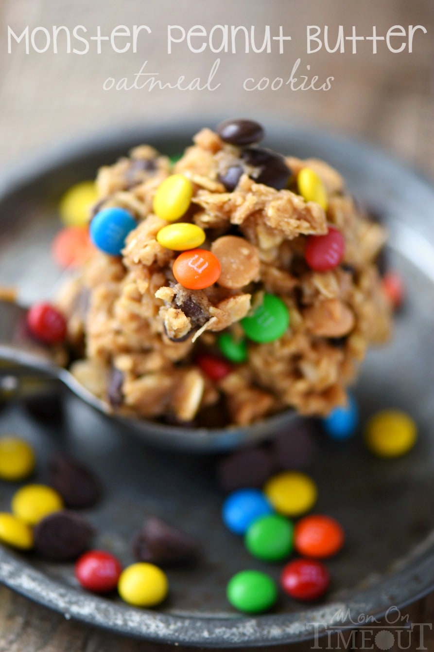 These Monster Peanut Butter Oatmeal Cookies have it ALL! Each bite is filled with chewy oats, peanut butter, chocolate chips and M&M's! Truly the perfect cookie! | Mom On Timeout #monstercookies #cookies #peanutbuttercookies #oatmealcookies #baking #dessert #desserts Monster Peanut Butter Oatmeal Cookies