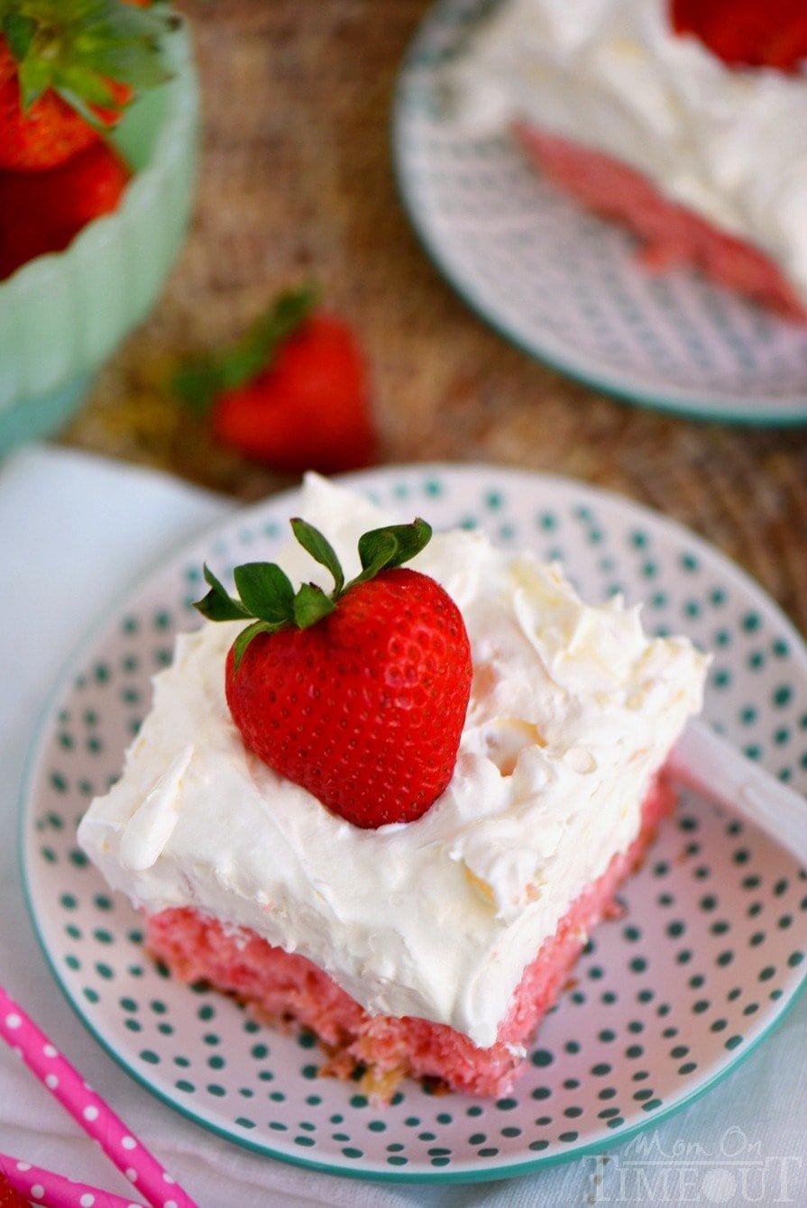 This Easy Strawberry Pineapple Cake is ideal for all Spring and Summer festivities! Delightfully easy to make and topped with the creamiest pineapple fluff frosting, this cake will quickly become your go-to dessert recipe! 