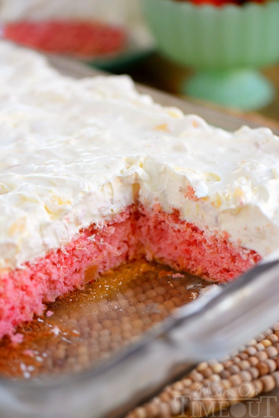 This Easy Strawberry Pineapple Cake is ideal for all Spring and Summer festivities! Delightfully easy to make and topped with the creamiest pineapple fluff frosting, this cake will quickly become your go-to dessert recipe!